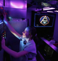 Young girl works on an engineering during a STEM field trip