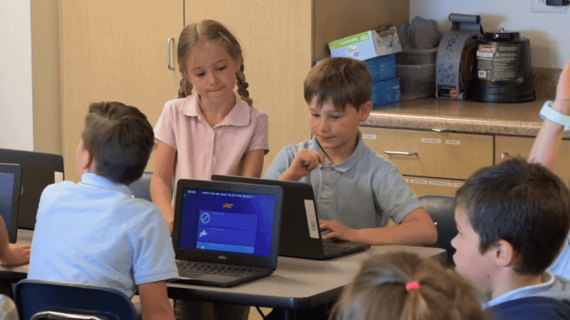 Young Students on Computers